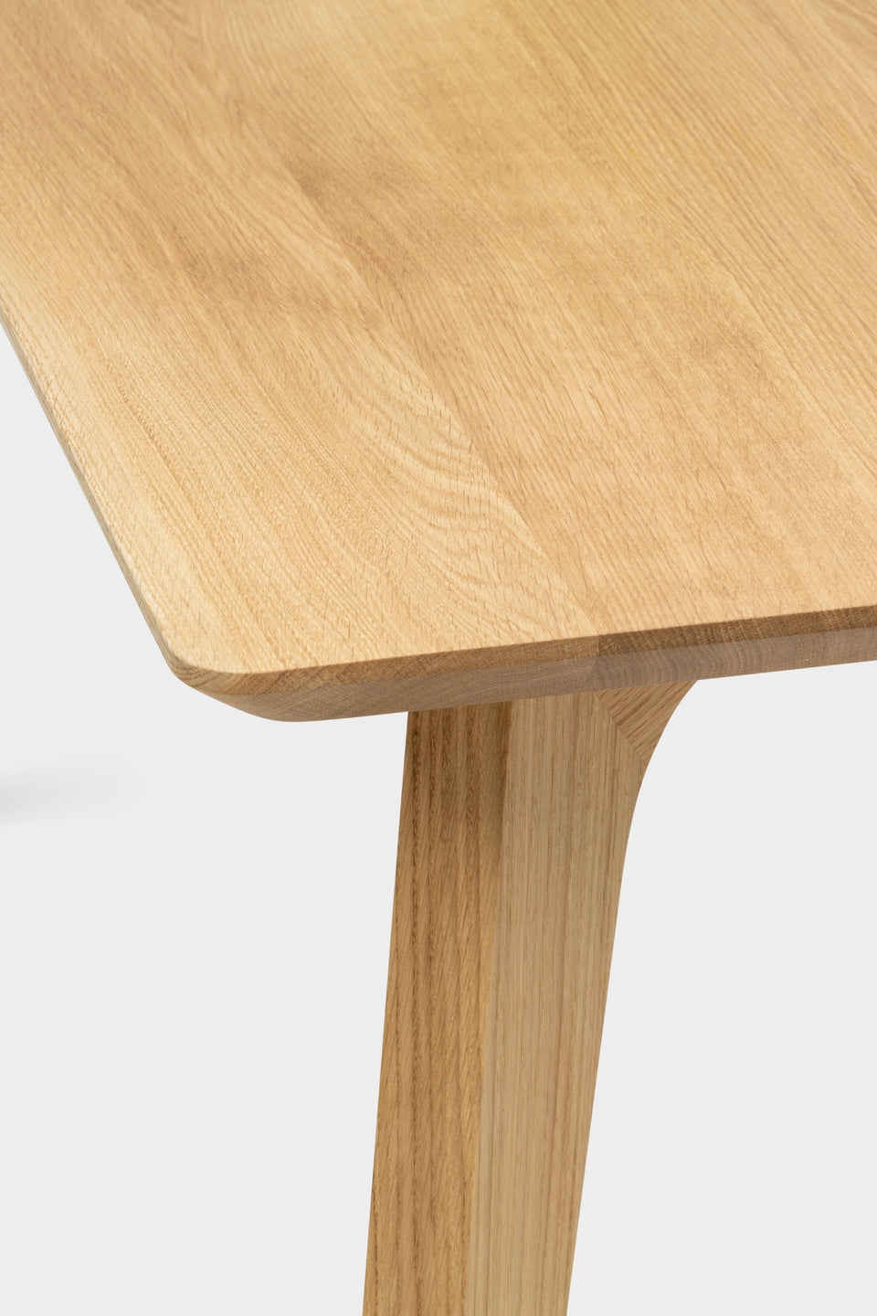 Crafted from solid oak or walnut with visible natural grain.